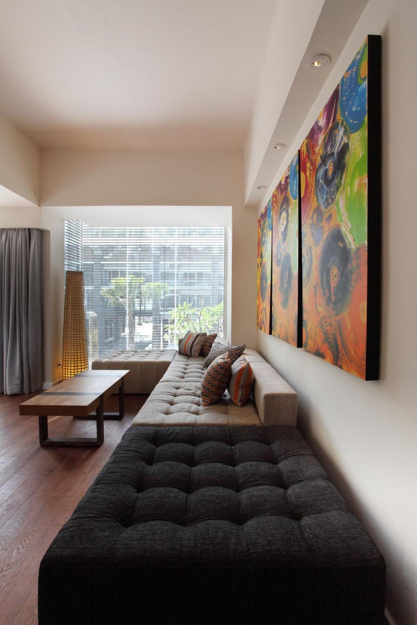 Ts Suites Семиняк Стая снимка A living room with a sofa