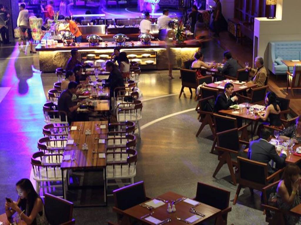 Ts Suites Семиняк Екстериор снимка The interior of the restaurant
